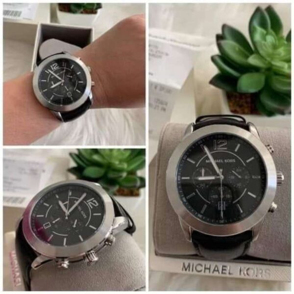 Reloj de plata con correa de cuero negra marca Michael kors Hombre