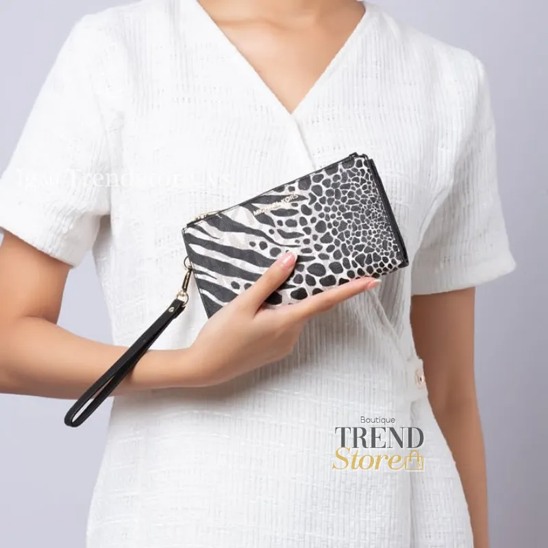 BILLETERA MICHAEL KORS - BILLETERA DOUBLE ZIP ANIMAL PRINT NEGRO