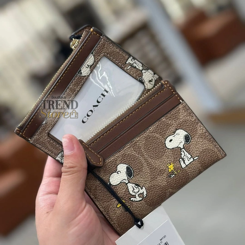 PORTADOCUMENTOS COACH X PEANUTS SNOOPY SIGNATURE