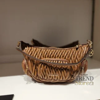 CARTERA MICHAEL KORS MERRITT CAFE TEXTURA