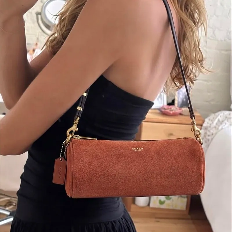 CARTERA COACH BARREL BAG DE ANTE Y CUERO SUEDE BRASS/CLAY